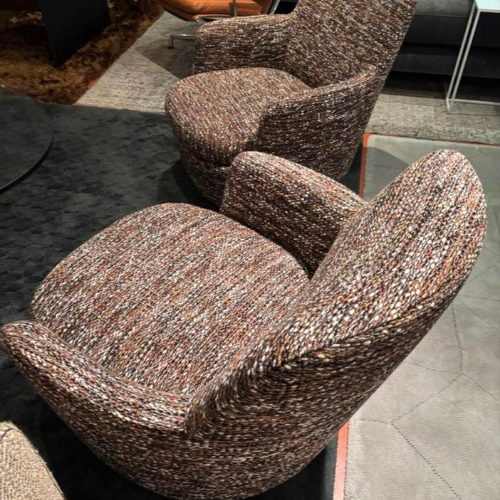 Minotti Jacques swivel armchairs