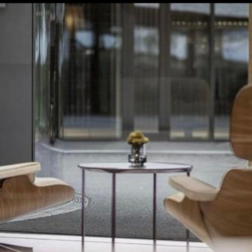 Vitra Lounge-Sessel + Hocker XL Walnuss
